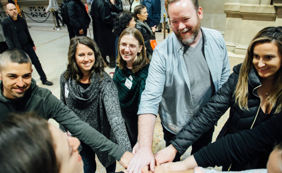 A group gets ready to take on a team building scavenger hunt.